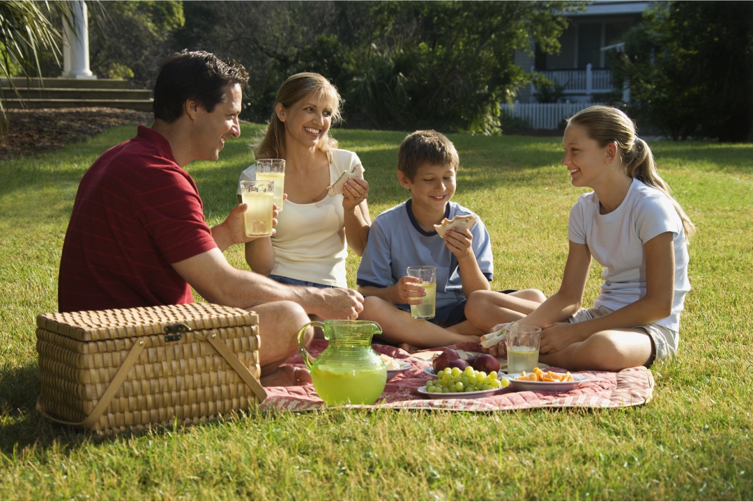 Family having picnic playing a game